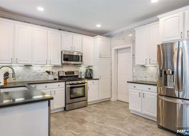 Property at 28 Carrington Pl, Clifton, NJ 07013, 2 beds, 2.5 baths
