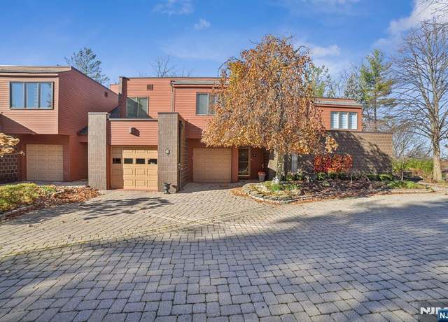 Property at 4 Hidden Ledge Rd, Englewood, NJ 07631, 4 beds, 3.5 baths