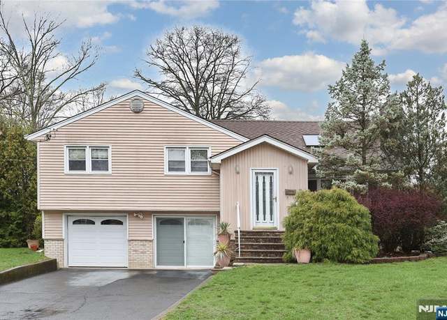 Property at 318 Willow Ct, Ridgewood, NJ 07450, 4 beds, 3 baths
