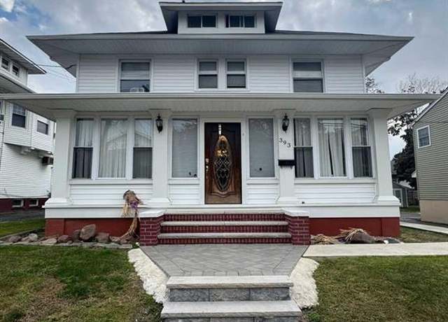 Property at 393-395 E 38th St, Paterson, NJ 07504, 7 beds, 3 baths
