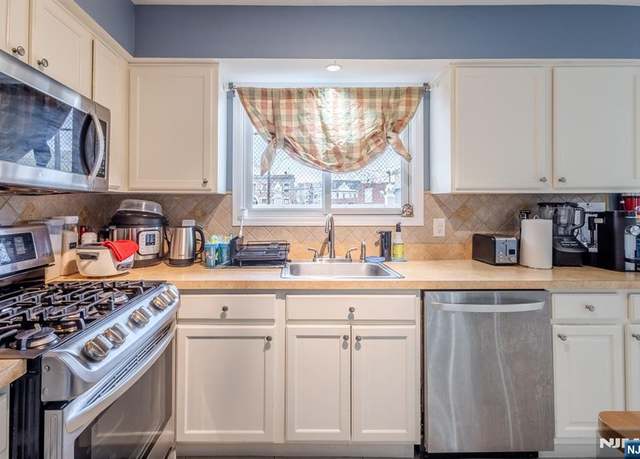 Property at 19 Valsumo Ln, Newark, NJ 07105, 4 beds, 2.5 baths