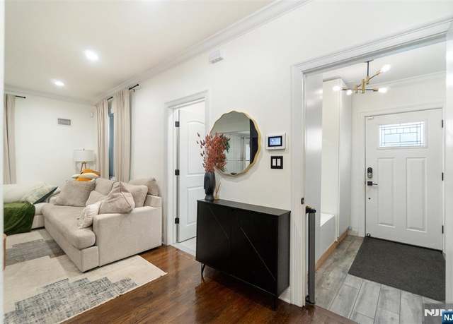 Property at 122 4th Ave, East Orange, NJ 07017, 5 beds, 2.5 baths