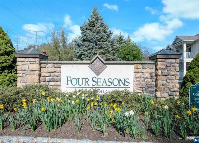 Property at 302 Holly Ln, Cedar Grove, NJ 07009, 2 beds, 2 baths