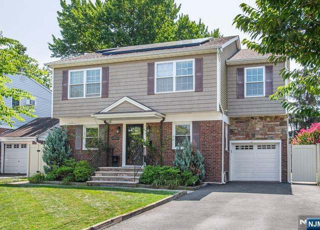 Property at 122 Hillman Dr, Elmwood Park, NJ 07407, 5 beds, 2.5 baths