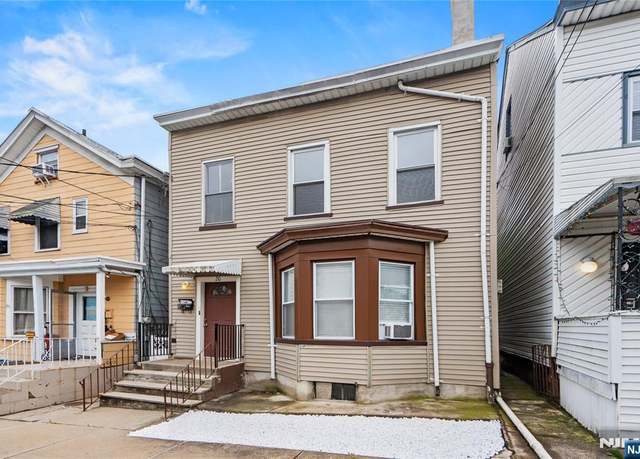Property at 20 Elk St, Paterson, NJ 07503, 4 beds, 2 baths