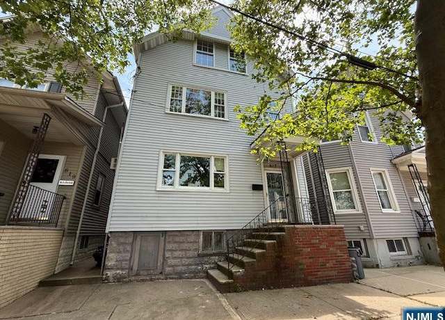 Property at 617 Warren St, Harrison, NJ 07029, 4 beds, 3 baths
