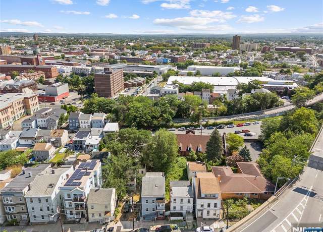 Property at 227 Mill St, Paterson, NJ 07501, 7 beds, 4 baths