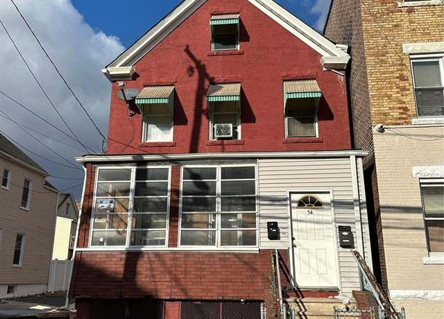 Property at 54 Passaic St, Passaic, NJ 07055, 4 beds, 2 baths