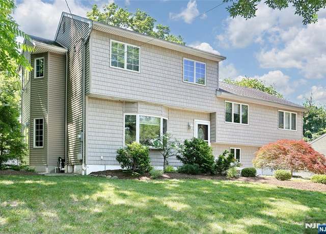 Property at 60 Harmon Dr, Paramus, NJ 07652, 5 beds, 3.5 baths