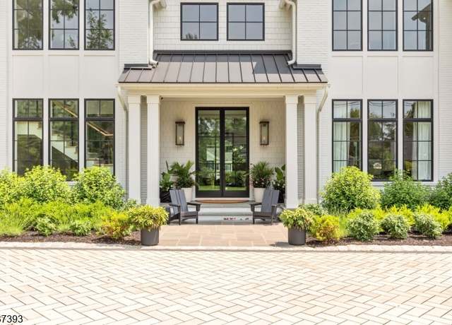 Property at 128 Woodland Ave, Westfield Town, NJ 07090-1815, 5 beds, 7.5 baths