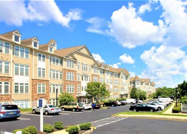 Property at 1403 Cedar Village Blvd #403, East Brunswick Twp., NJ 08816-1385, 2 beds, 2 baths