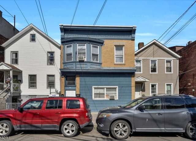 Property at 44 3Rd St, Passaic City, NJ 07055-7414, 5 beds, 2 baths