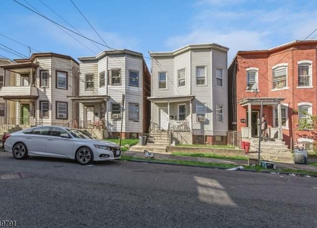 Property at 81 George St, Paterson City, NJ 07503-2318, 5 beds, 2 baths