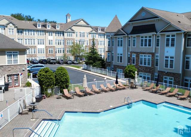 Property at 1102 Cedar Village Blvd, East Brunswick, NJ 08816, 2 beds, 2 baths