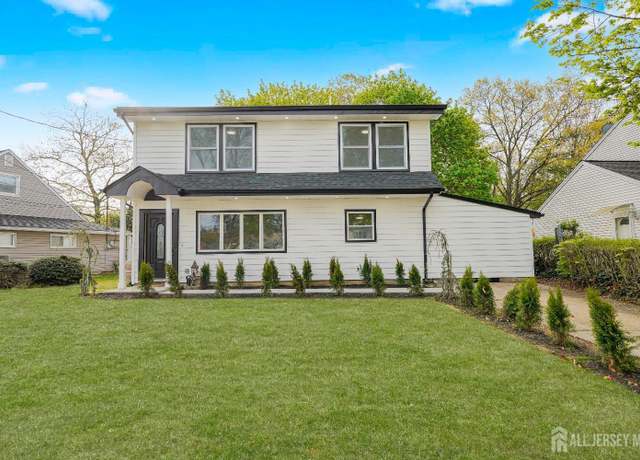 Property at 2 Buttonwood Dr, Parlin, NJ 08859, 4 beds, 2 baths