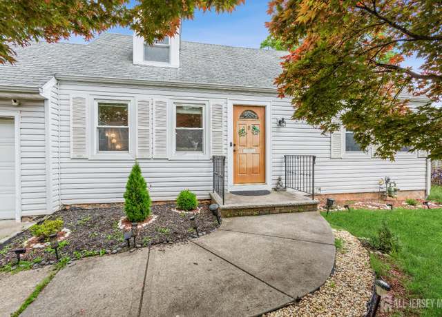 Property at 8 Longfellow Dr, Colonia, NJ 07067, 4 beds, 3 baths