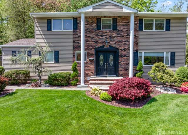 Property at 21 Colonial Dr, East Brunswick, NJ 08816, 5 beds, 2.5 baths