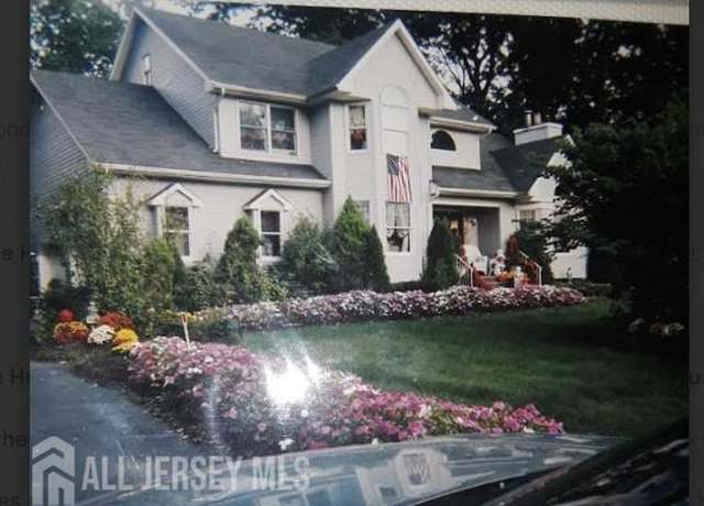Property at 114 Greenwood Rd, Morganville, NJ 07751, 3 beds, 2.5 baths