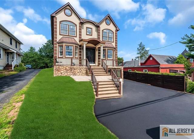 Property at 1855 Woodland Ave, Edison, NJ 08820, 5 beds, 4.5 baths
