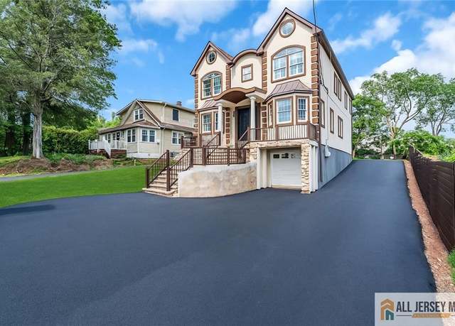 Property at 1855 Woodland Ave, Edison, NJ 08820, 5 beds, 4.5 baths