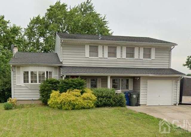 Property at 21 Goodfellow Dr, Port Reading, NJ 07064, 4 beds, 2 baths
