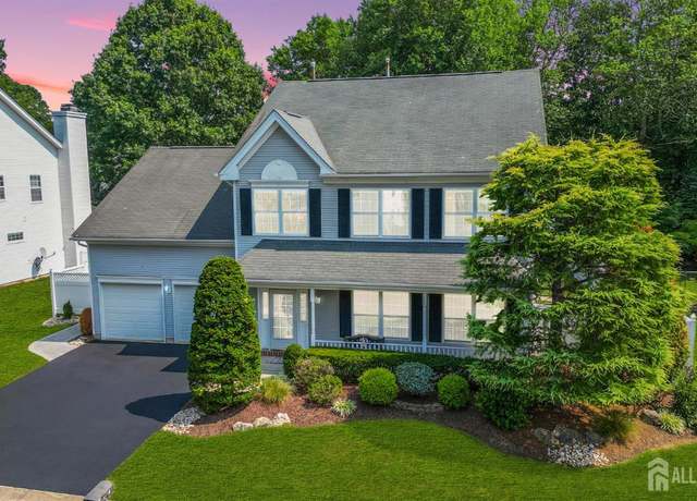 Property at 303 Sundew Dr, Morganville, NJ 07751, 4 beds, 2.5 baths