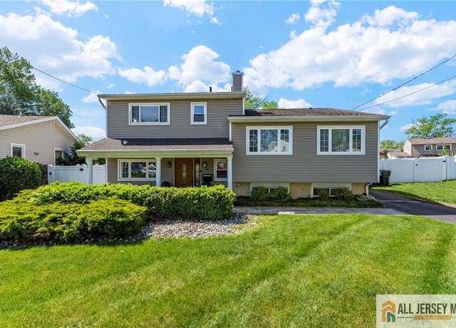 Property at 21 Starlight Dr, Colonia, NJ 07067, 4 beds, 2 baths