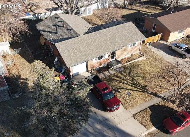 Property at 1401 Bates Dr, Colorado Springs, CO 80909, 4 beds, 2 baths