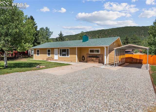 Property at 721 N Baldwin St, Woodland Park, CO 80863, 4 beds, 2 baths
