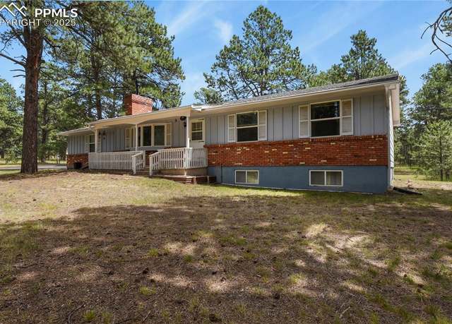 Property at 8045 Bar X Rd, Colorado Springs, CO 80908, 5 beds, 3 baths