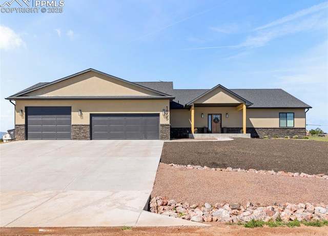 Property at 1855 N Buckboard Ave, Pueblo West, CO 81007, 5 beds, 3.5 baths