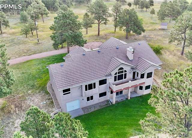 Property at 10315 Burgess Rd, Colorado Springs, CO 80908, 4 beds, 3 baths