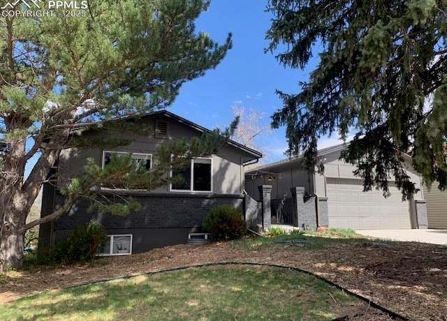 Property at 4945 Brown Valley Ln, Colorado Springs, CO 80918, 5 beds, 3 baths