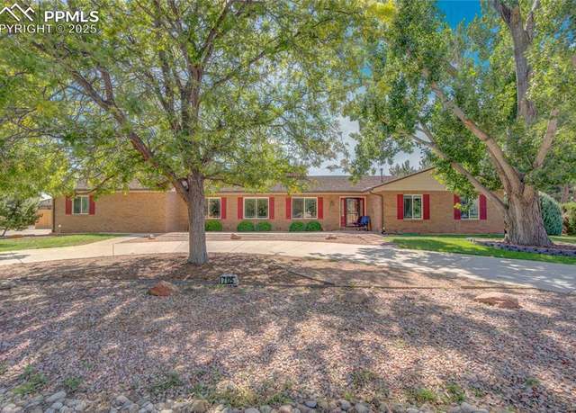 Property at 7125 Sand Trap Dr, Colorado Springs, CO 80925, 4 beds, 2 baths