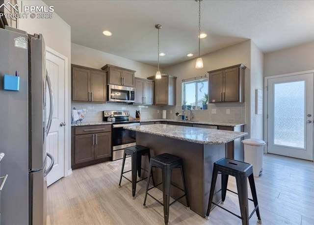 Property at 8285 Lodge Grass Way, Colorado Springs, CO 80908, 4 beds, 3.5 baths