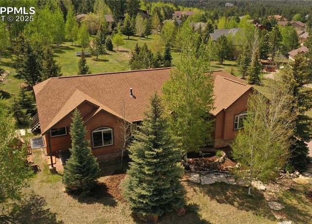 Property at 1121 Windflower Ln, Woodland Park, CO 80863, 5 beds, 3 baths