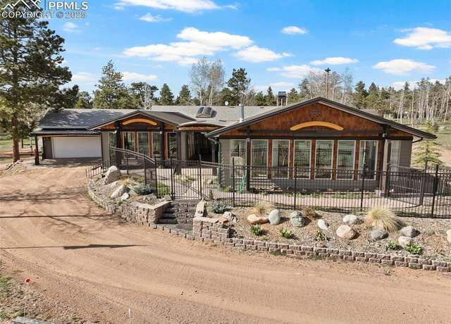 Property at 100 Kinnikinnik Dr, Woodland Park, CO 80863, 5 beds, 5 baths