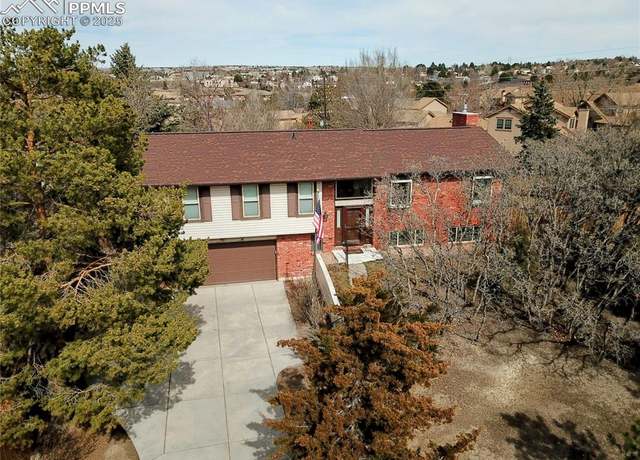Property at 6115 Castlewood Ln, Colorado Springs, CO 80918, 3 beds, 3 baths