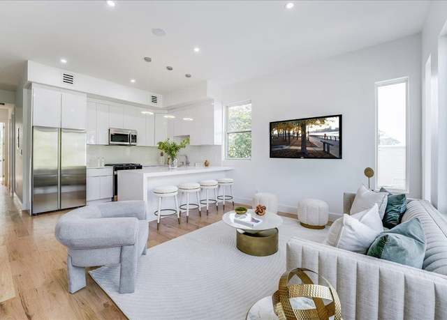Property at 63 STEGMAN St #2, Jersey City, NJ 07305, 3 beds, 2 baths