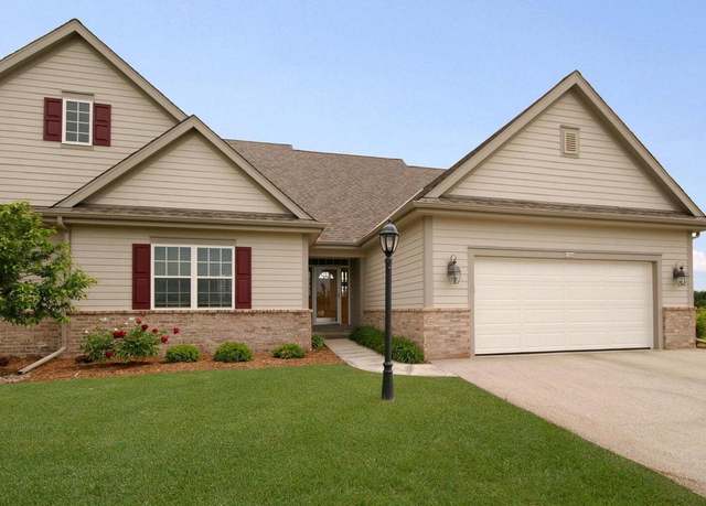 Property at 1784 Woodland Way Unit 220-2, Slinger, WI 53086, 3 beds, 3 baths