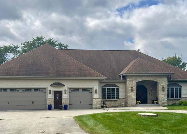 Property at N52W35577 W Lake Dr, Oconomowoc, WI 53066, 6 beds, 5 baths