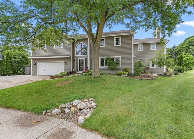 Property at 1021 Aspen Pl, West Bend, WI 53095, 4 beds, 3.5 baths