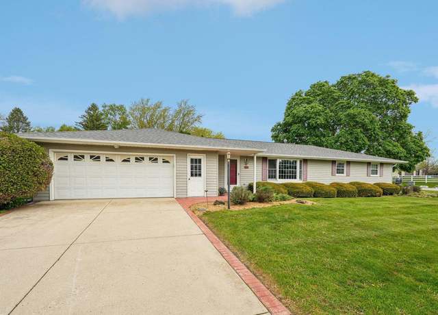 Property at 718 Marigold St, Oconomowoc, WI 53066, 4 beds, 2 baths