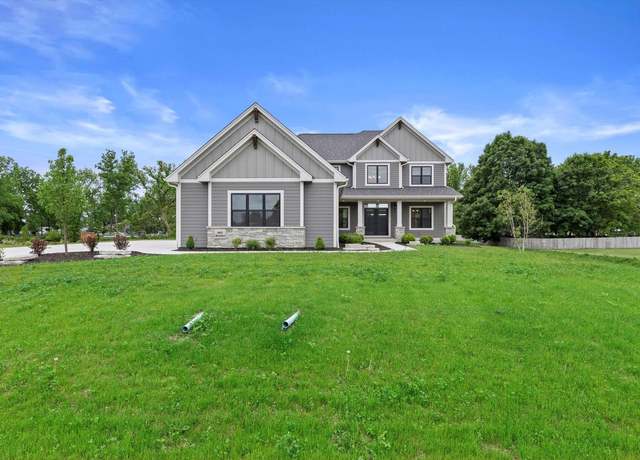Property at N65W34963 Baltic Pass, Oconomowoc, WI 53066, 4 beds, 2.5 baths