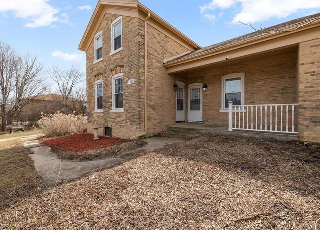 Property at 303 E Paradise Dr, West Bend, WI 53095, 5 beds, 2 baths