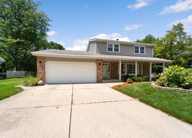 Property at 5115 Russell Court East Ct, Greendale, WI 53129, 4 beds, 2 baths
