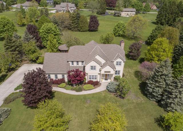 Property at 8024 W Poplar Dr, Mequon, WI 53097, 5 beds, 4.5 baths