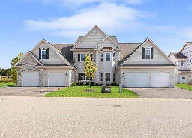 Property at 1887 Woodland Way Unit 420-4, Slinger, WI 53086, 3 beds, 2 baths