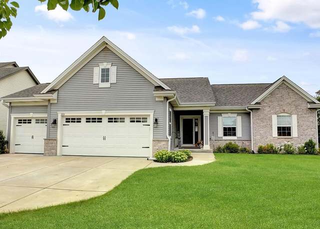 Property at 1410 Blazing Star Dr, Oconomowoc, WI 53066, 4 beds, 3 baths