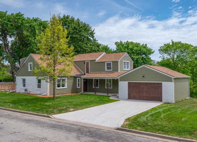 Property at 1120 N 124th St, Wauwatosa, WI 53226, 4 beds, 3 baths